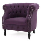 Fauteuil club contemporain capitonné avec clous de tapissier