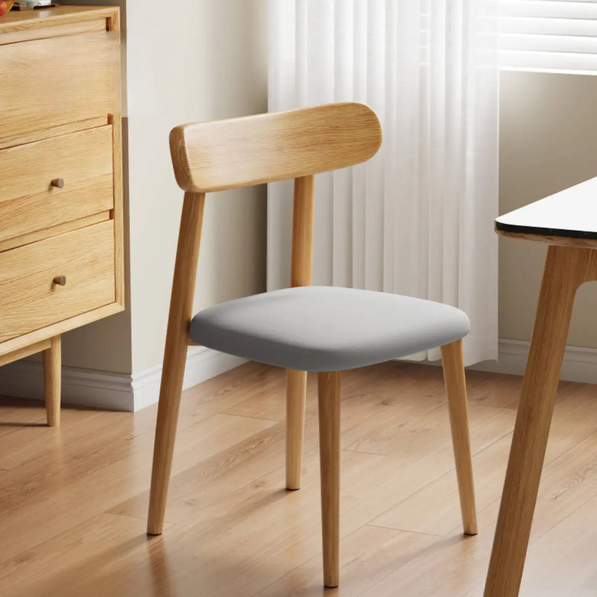 Chaise de salle à manger moderne sans accoudoirs en cuir à dossier bas