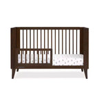 Lit de bébé convertible 4-en-1 Delta Children Ollie avec conversion en lit de jour
