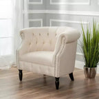 Fauteuil club contemporain capitonné avec clous de tapissier