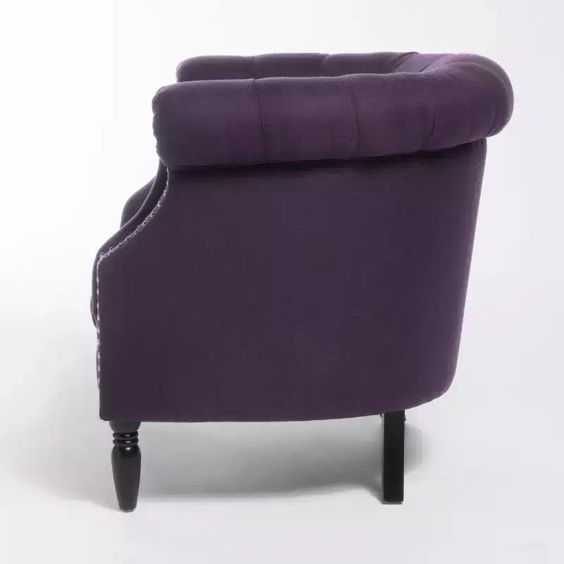 Fauteuil club contemporain capitonné avec clous de tapissier