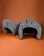 Fauteuil sculptural en satin et velours rayé