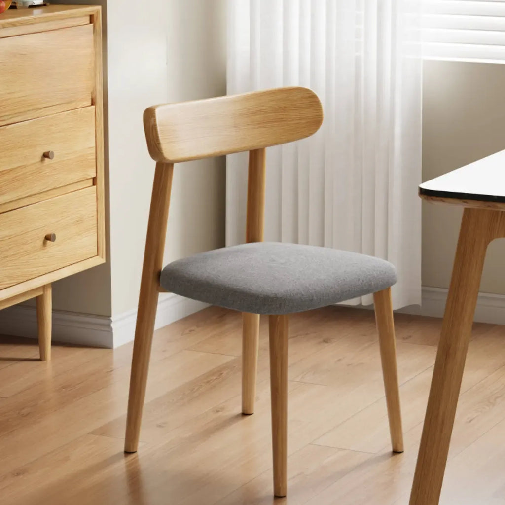 Chaise de salle à manger moderne sans accoudoirs en cuir à dossier bas