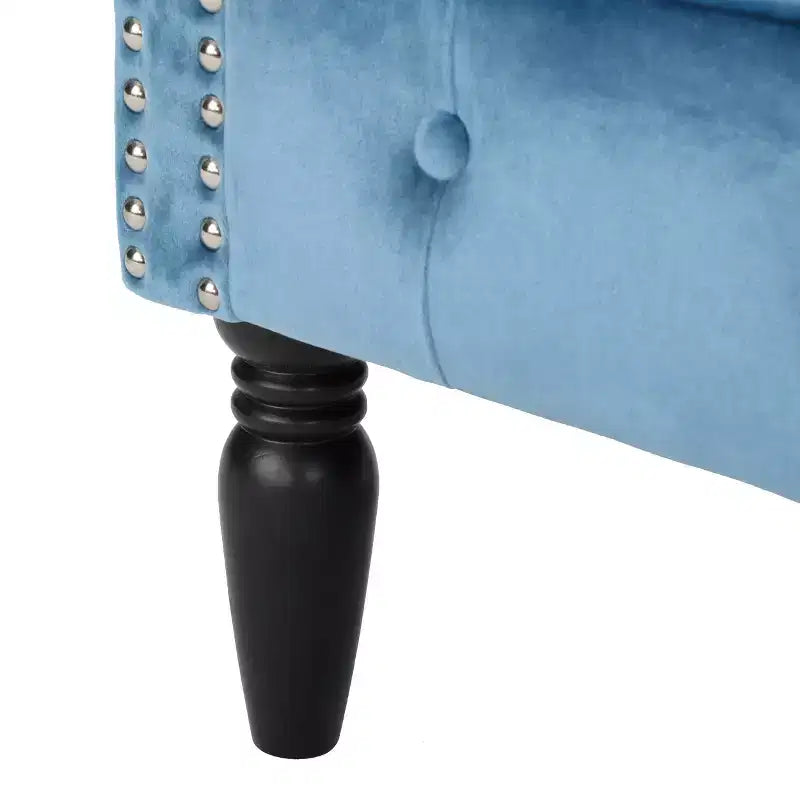 Fauteuil club contemporain capitonné avec clous de tapissier