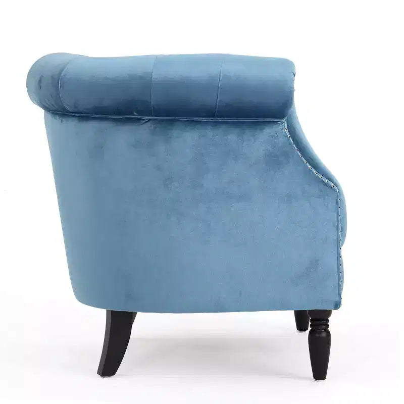 Fauteuil club contemporain capitonné avec clous de tapissier