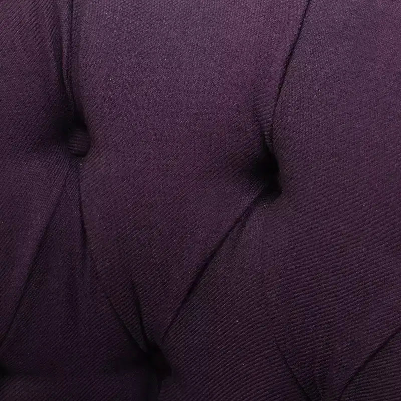 Fauteuil club contemporain capitonné avec clous de tapissier