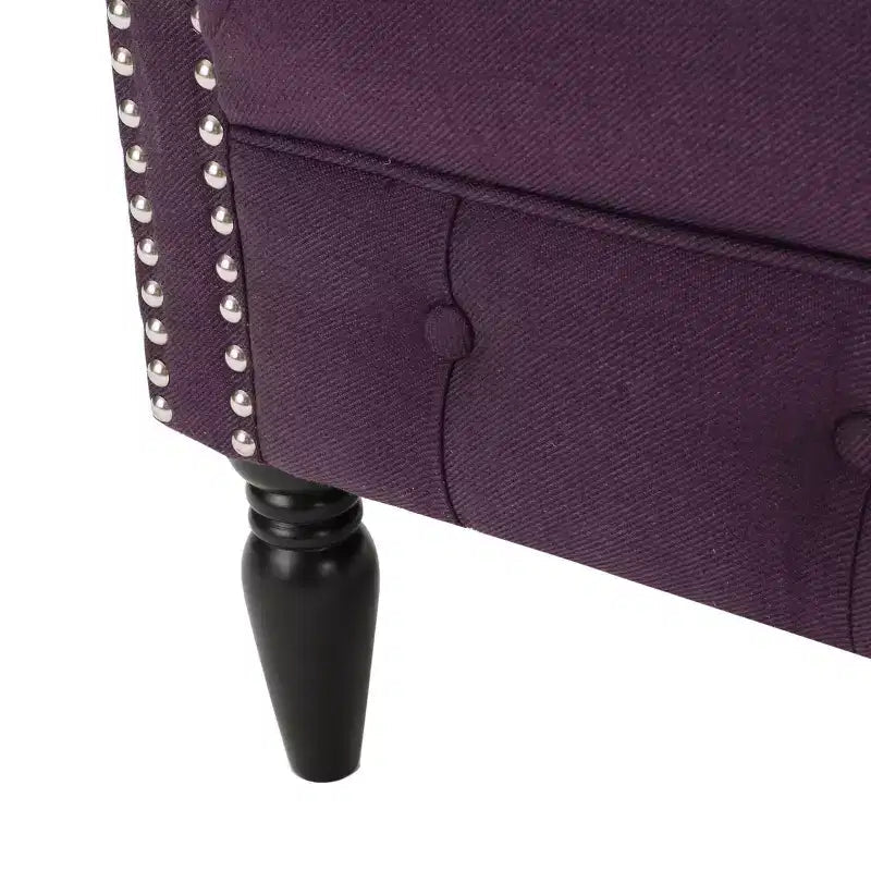 Fauteuil club contemporain capitonné avec clous de tapissier