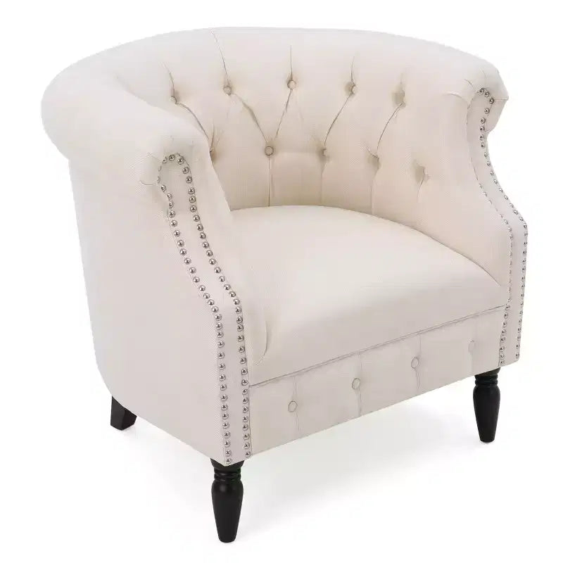Fauteuil club contemporain capitonné avec clous de tapissier