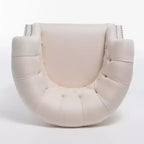 Fauteuil club contemporain capitonné avec clous de tapissier