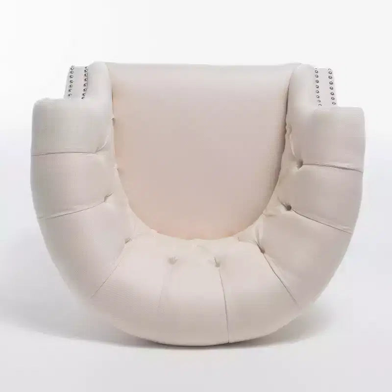 Fauteuil club contemporain capitonné avec clous de tapissier