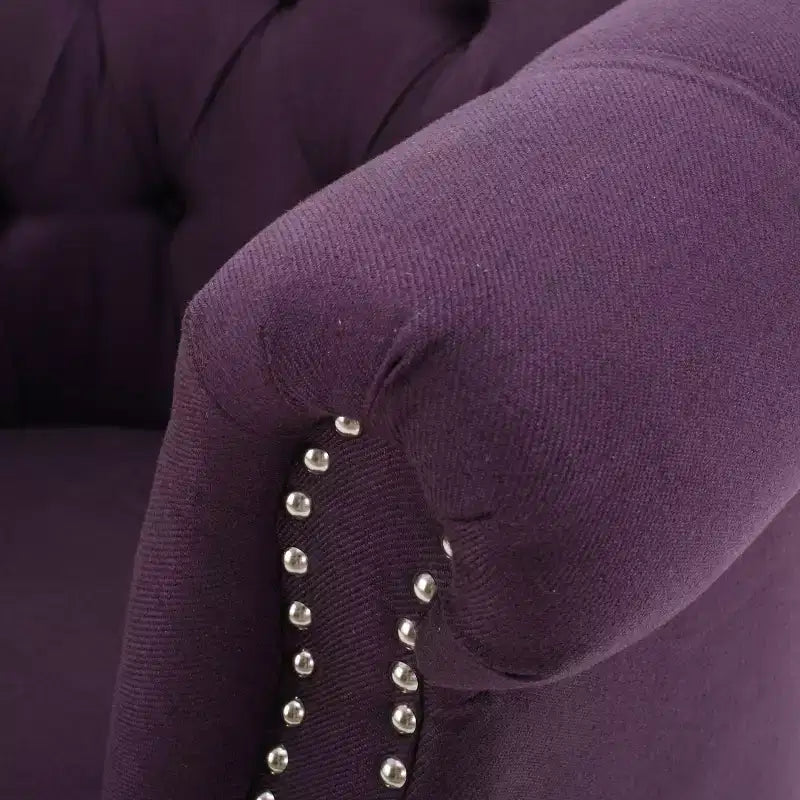 Fauteuil club contemporain capitonné avec clous de tapissier